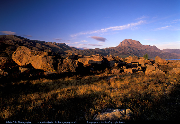 Glacial erratics on the banks of Loch Maree and Slioch at sunset