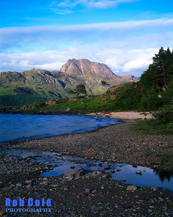 A view of Slioch across Loch Maree in soft evening light